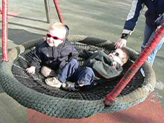 playground=basketswing sitting_disability=yes Basket/Wave/Hammock swing - note users normally lie down on this as opposed to sitting up on other types of swing