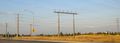 Roseville Electric dual-circuit 60 kV line crossing below other power lines on a low and wide two-legged steel tower.