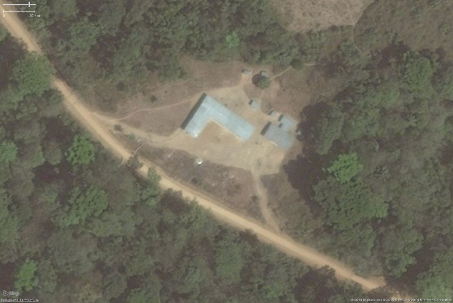 A typical rural school in West Africa. While not exactly the classic school area, you can see it still has the key features: 1 or 2 long buildings, 1 or 2 smaller toilet buildings, a large bare field. The overall school property should be tagged with amenity=school and the buildings with building=yes.