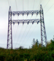 An untypical power=tower right next to a power plant. Not very high voltage, as seen from the insulators.